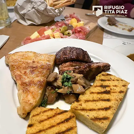 Rifugio Escursionistico Tita Piaz فندق أمبيزو